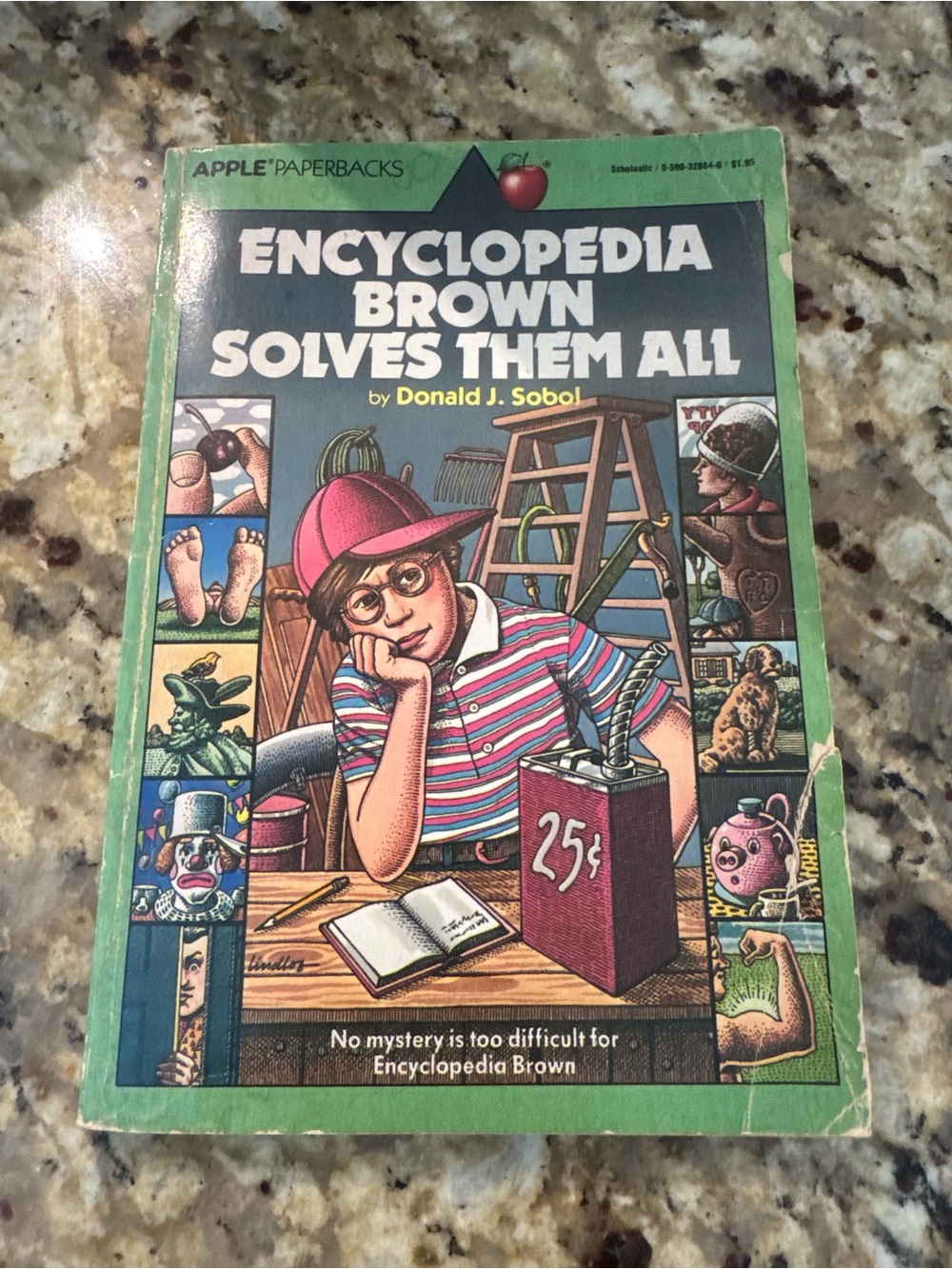 Encyclopedia Brown Solves Them All - Slight tear on cover